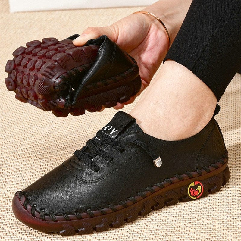 Flache Slip-On-Schuhe aus Leder 